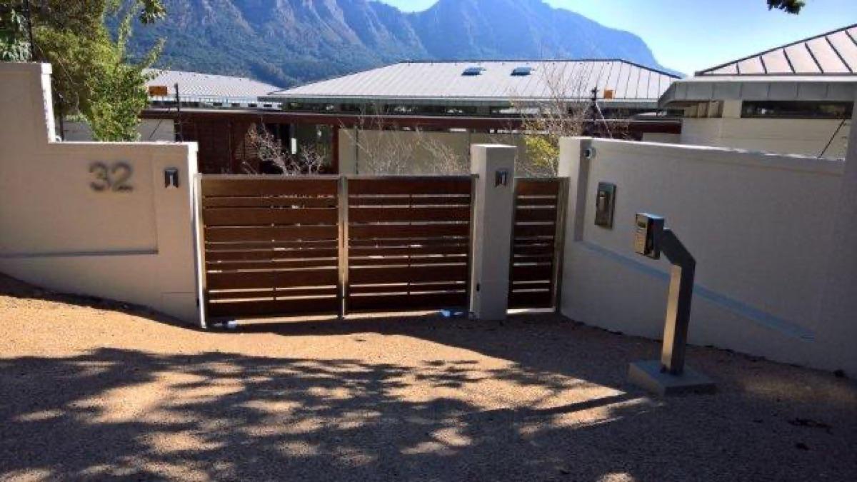 Stainless steel and timber security gate with mountain view, Cape Town