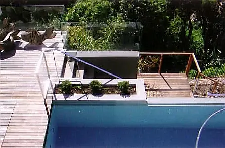 Steel balustrade and timber pool deck on luxury Constantia estate, Cape Town